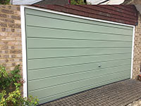 Garage door painted by Hart Decorating, Hartley Wintney, Hampshire